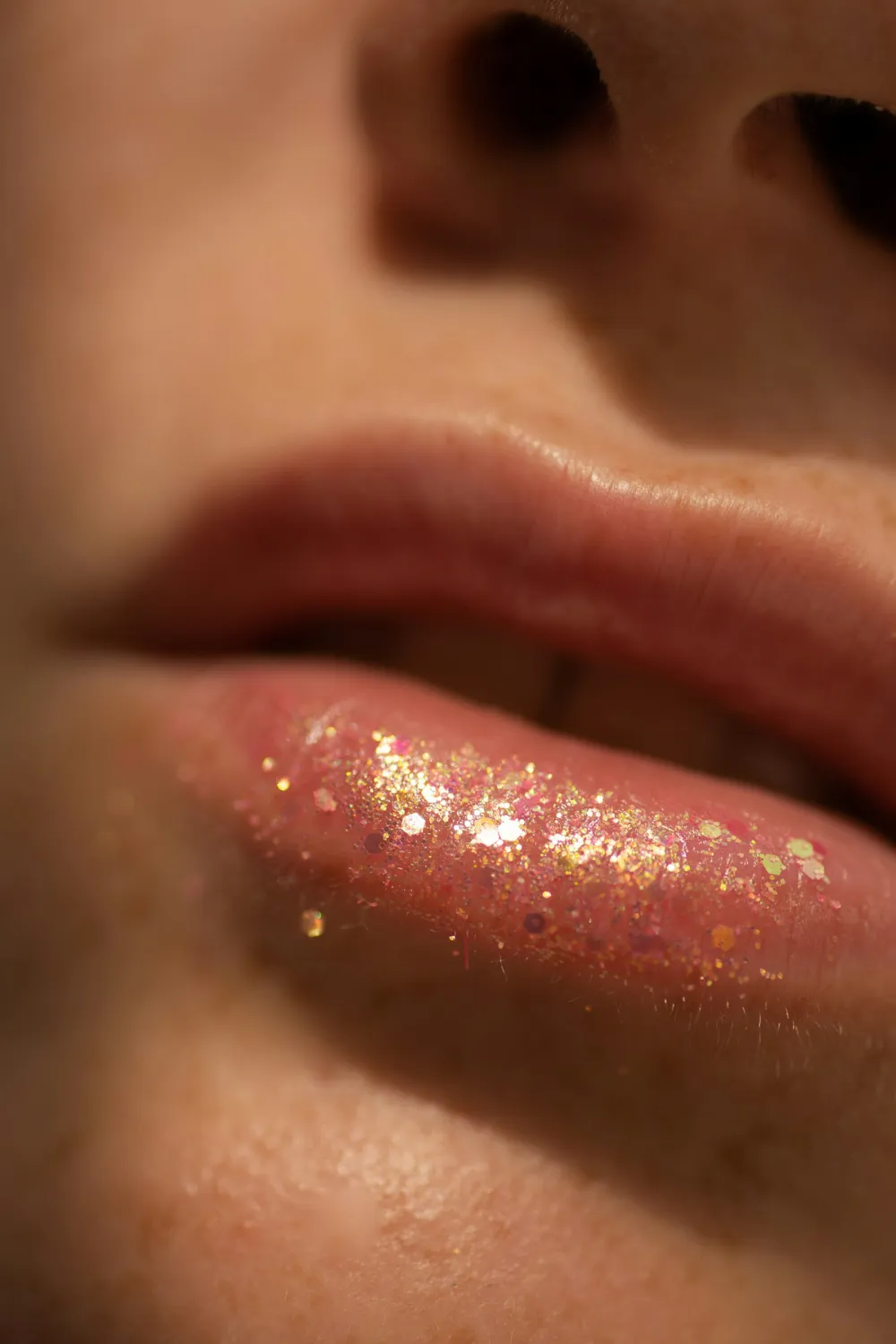 Close-up of smooth, hydrated-looking lips with a soft glossy finish